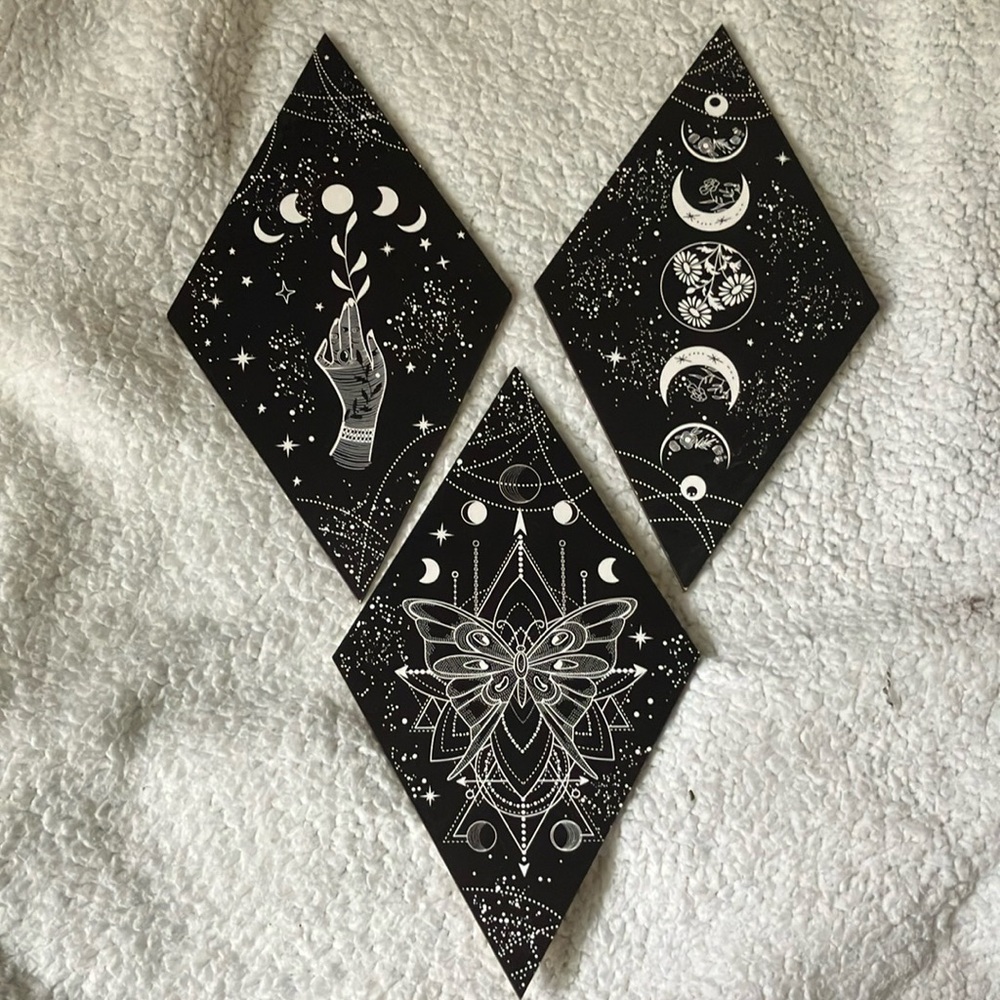 Set of three wall plaques. Black and white